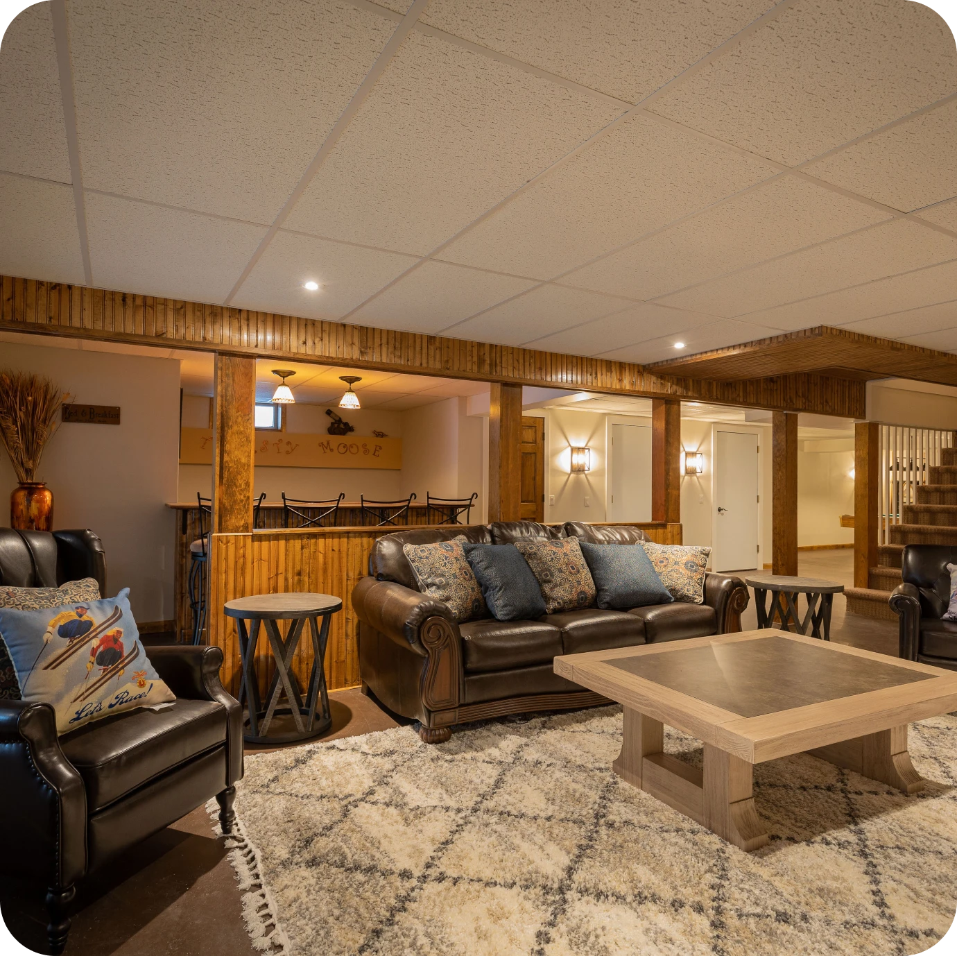 Modern basement with leather furniture